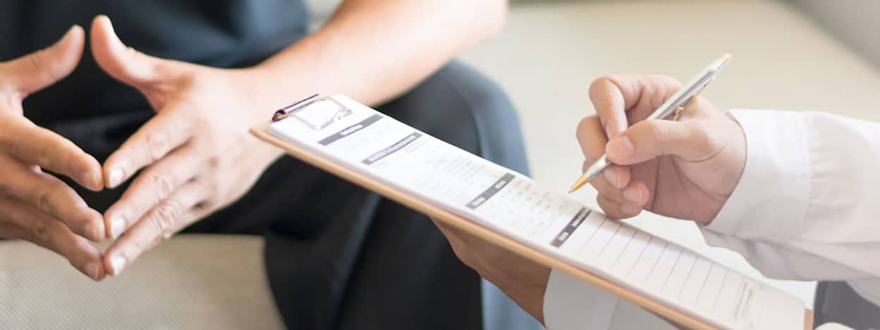 Doctor and patient with chart