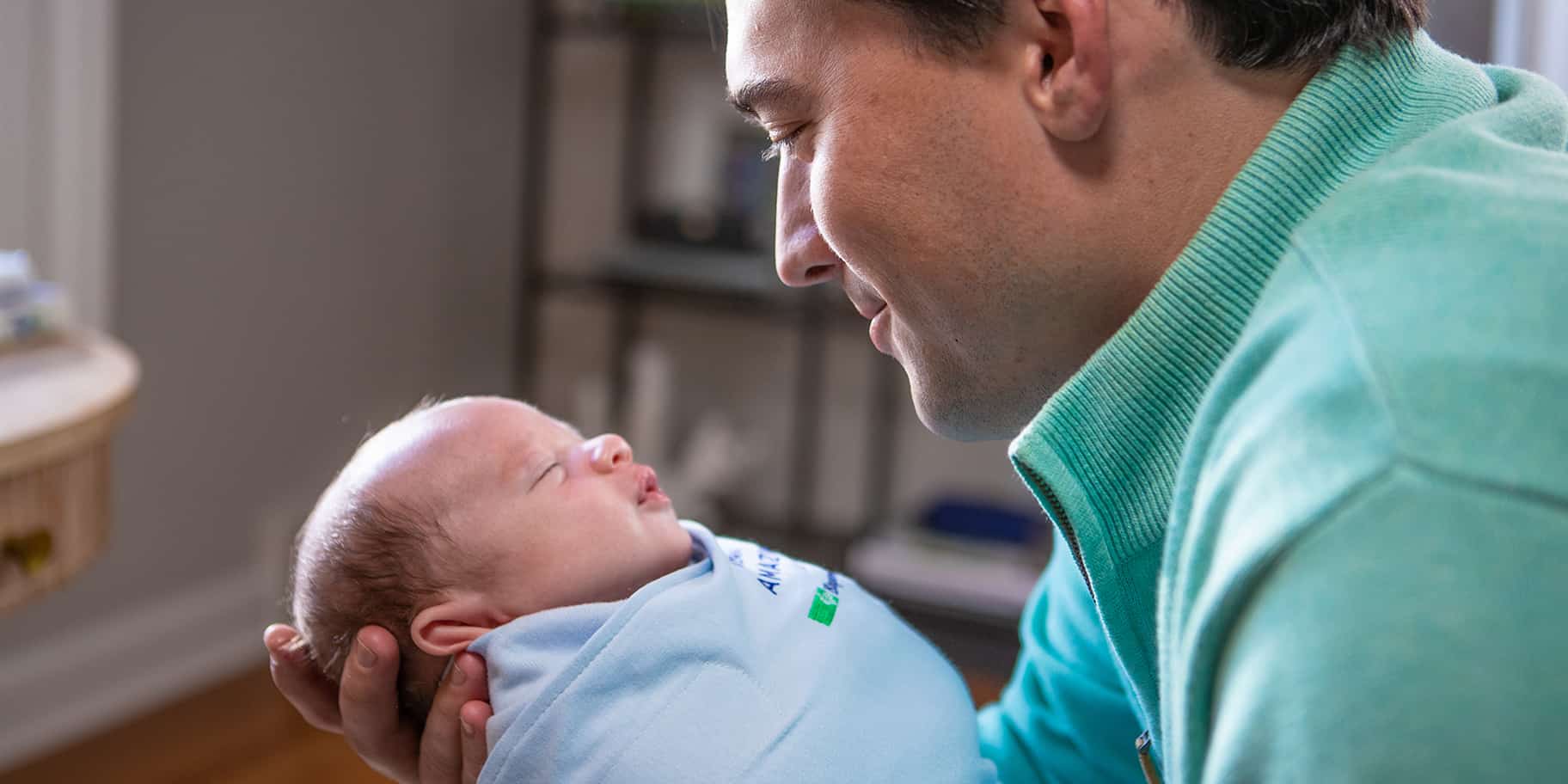 Man holding a baby
