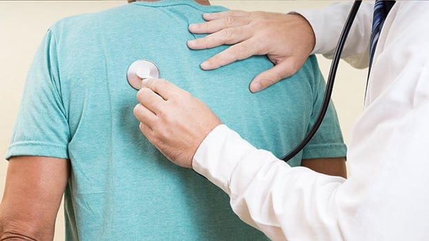 Doctor using a stethoscope