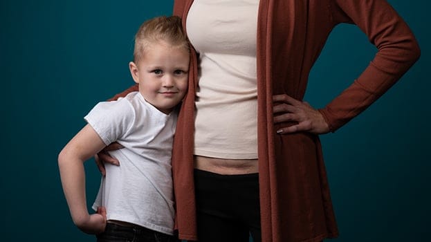 Woman hugging a child