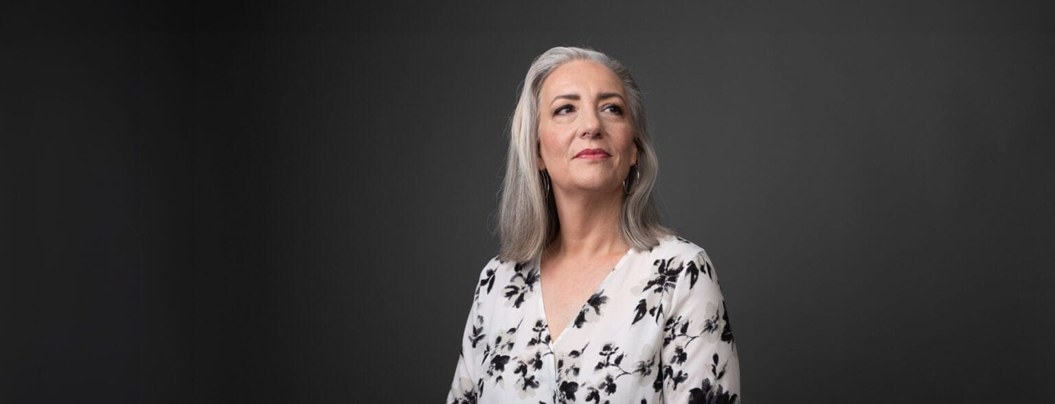 Smiling woman wearing glasses